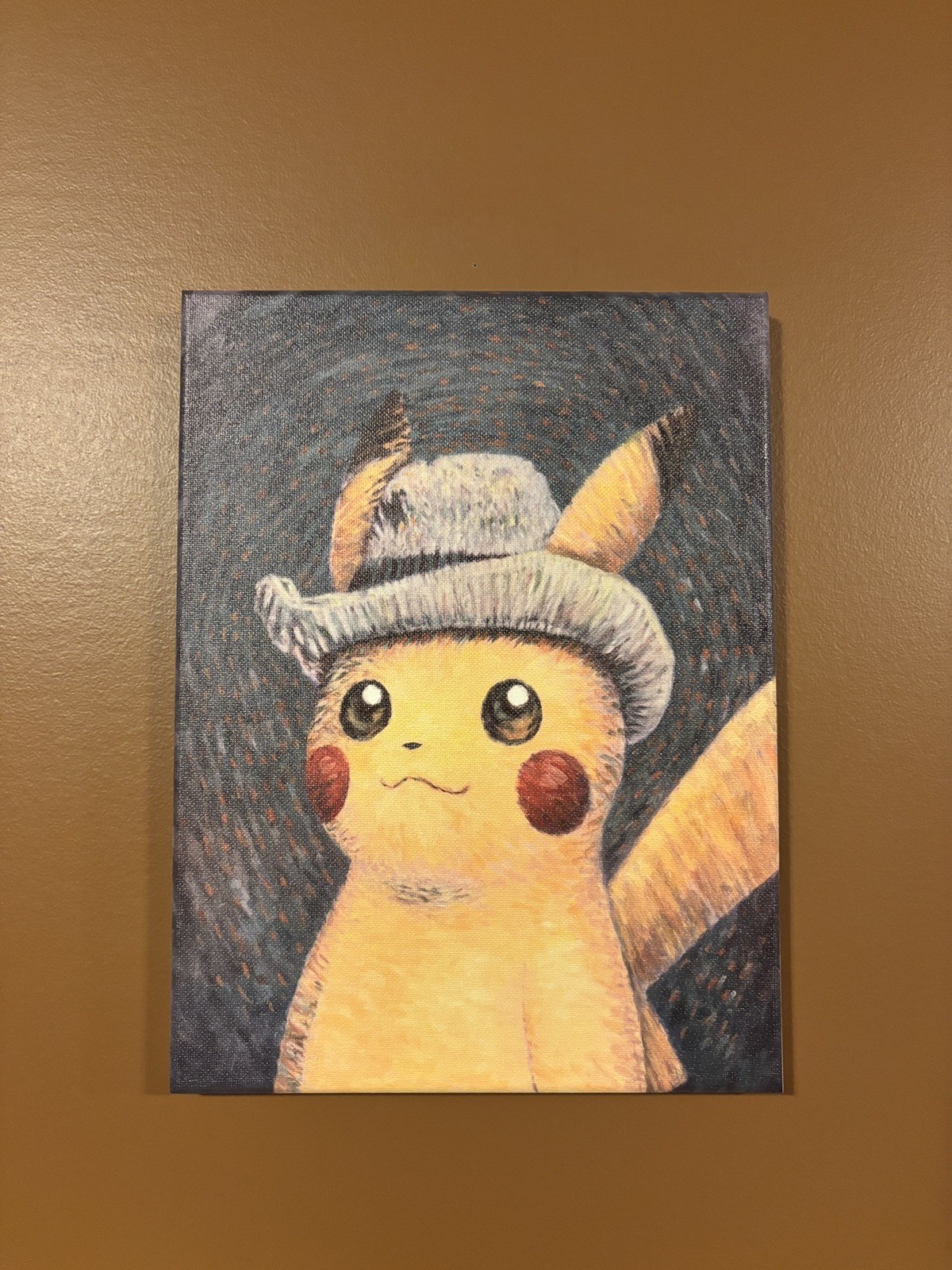 Pokemon Pikachu with grey felt hat wall art on a 9×12 canvas