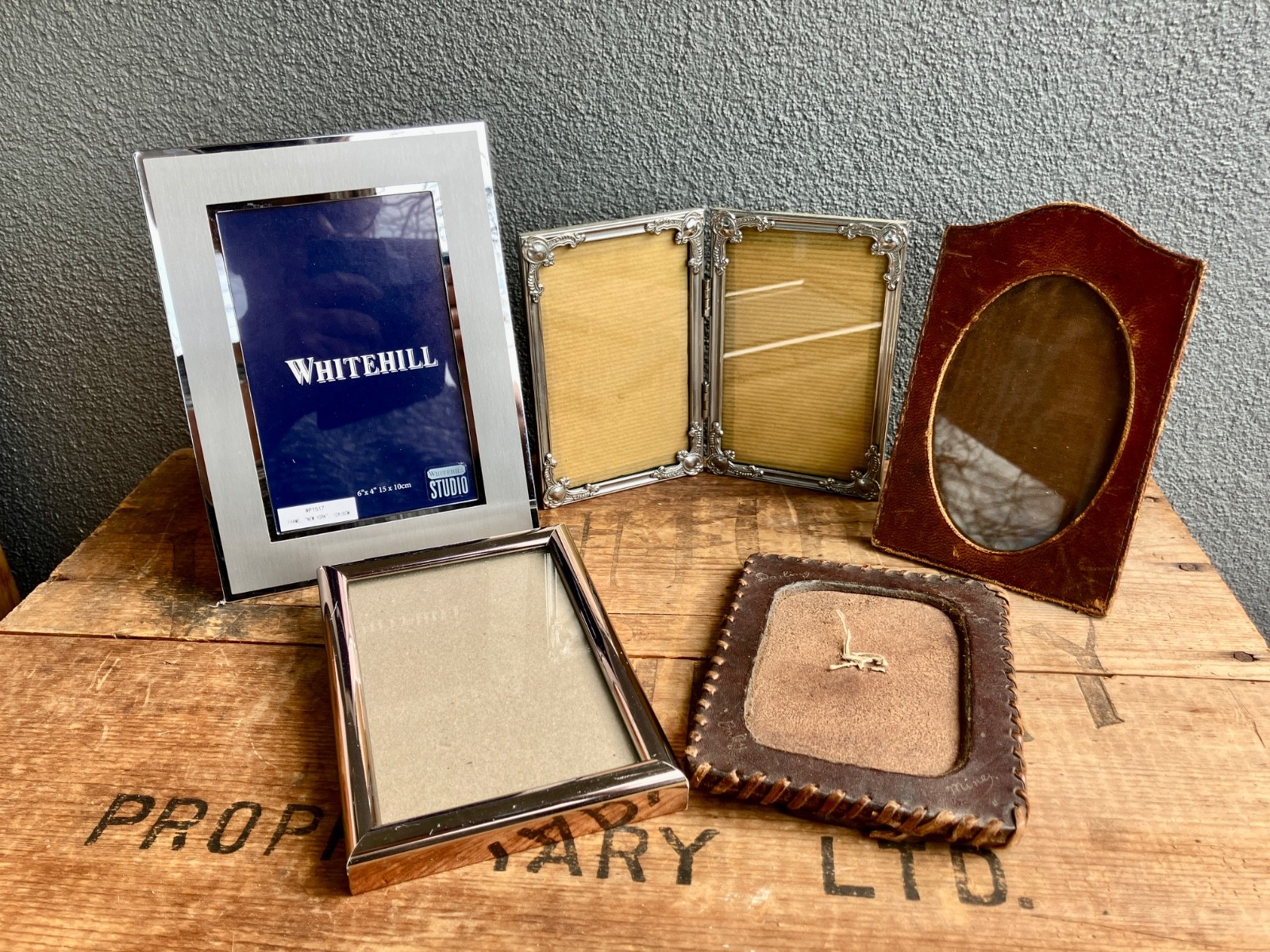 Vintage lot of 5 various silver and leather empty picture frames.