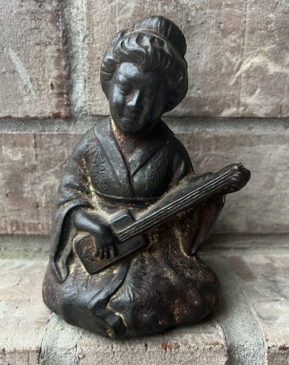 Hubley Cast Iron Asian Girl Playing Instrument Door Stop