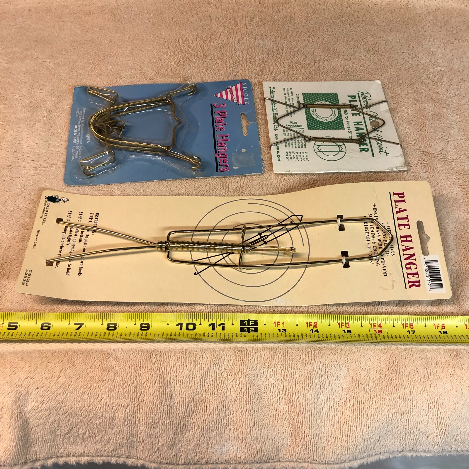 LOT OF 5 PLATE HANGERS