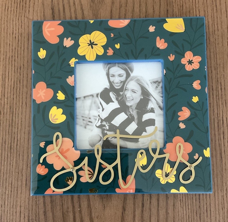Francesca&rsquo;s “Sisters” branded frame in vivid multicolor flowers finish