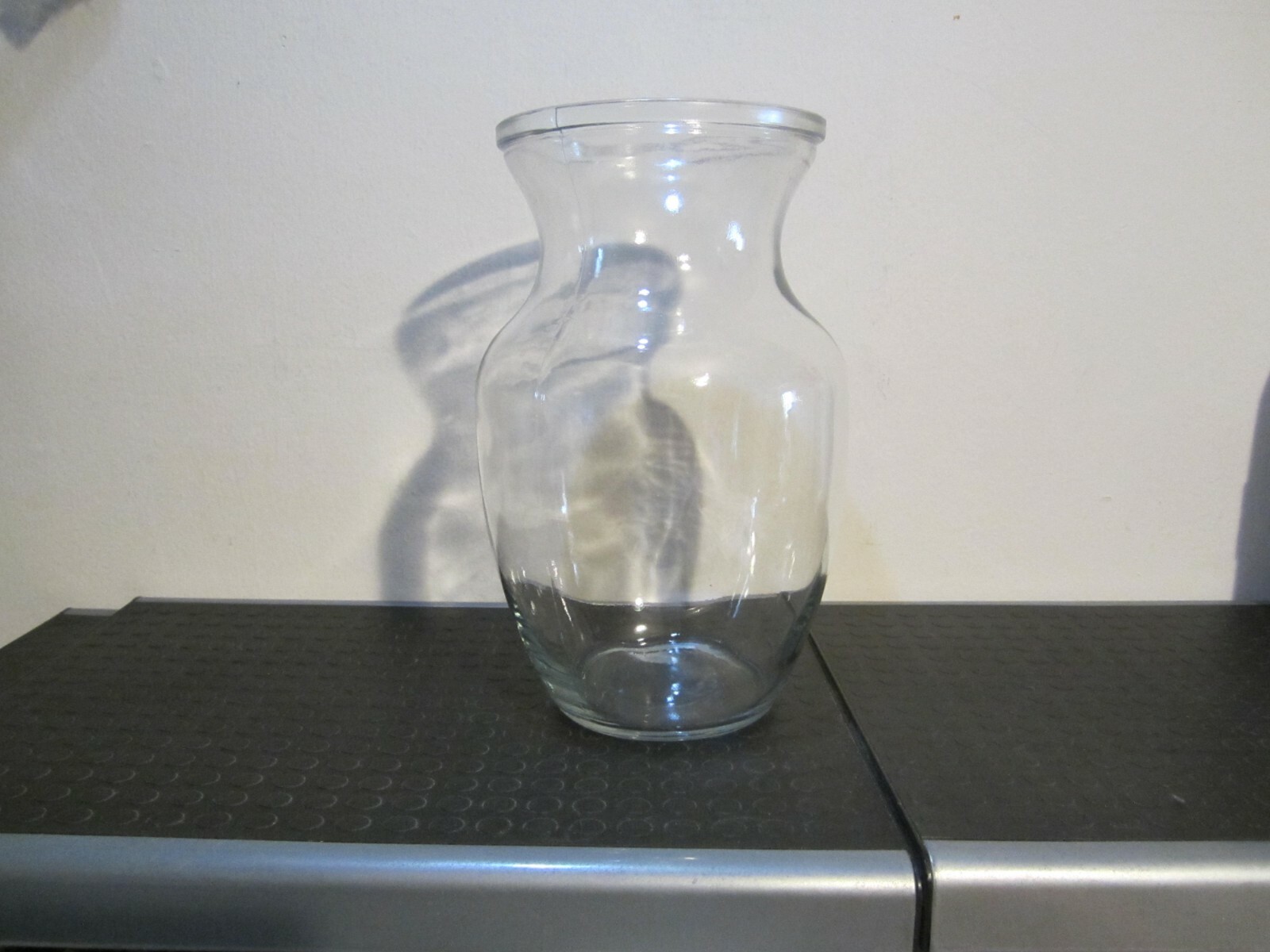 Large glass flower vase, clear, 8 inches tall, 4 1/4 inches opening at very top