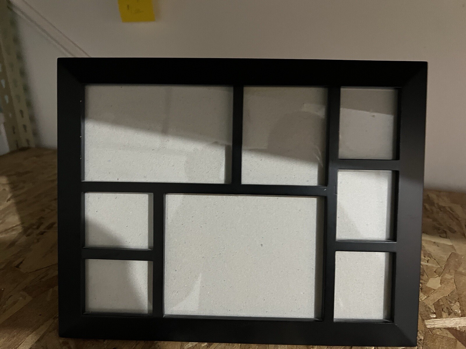 Black picture frame with 8 compartments 5-2×3, 3×3.5, 4×6