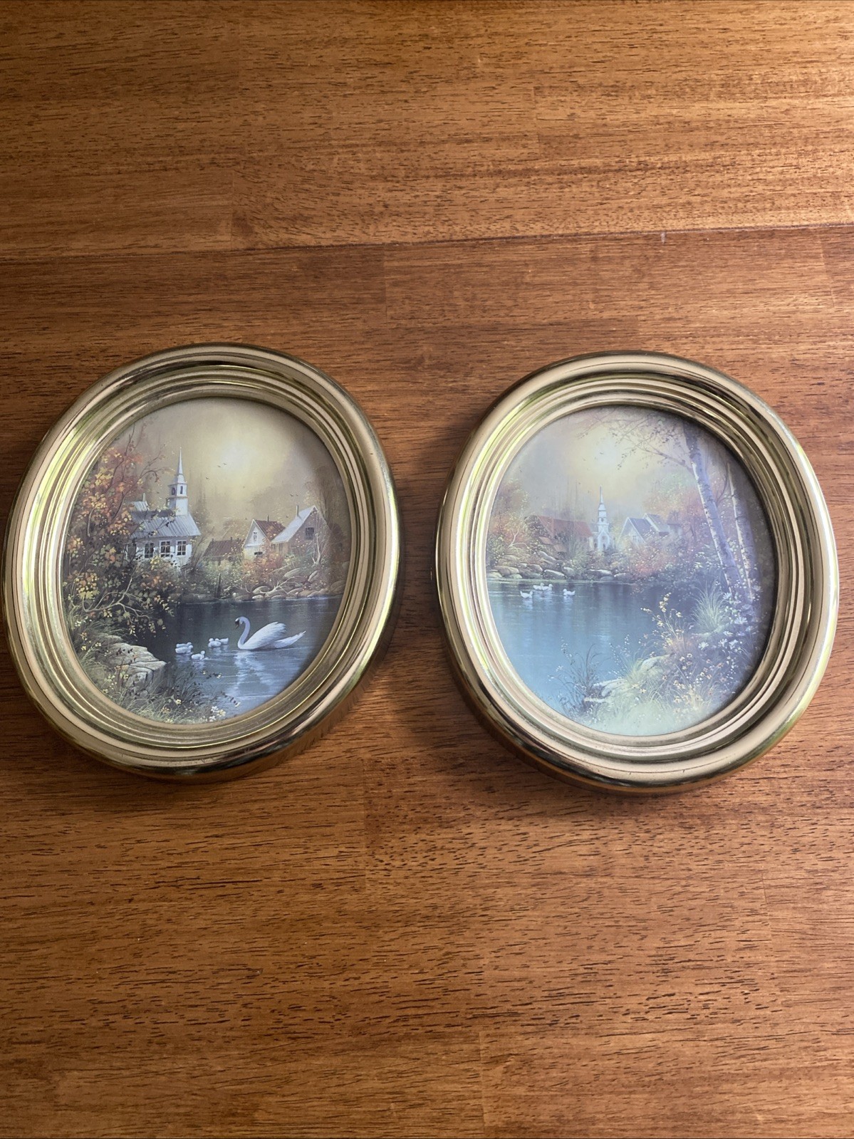 Two (2) framed oval Syroco pictures 6 1/2 x 7 1/2 Church,Swans, Houses ￼￼