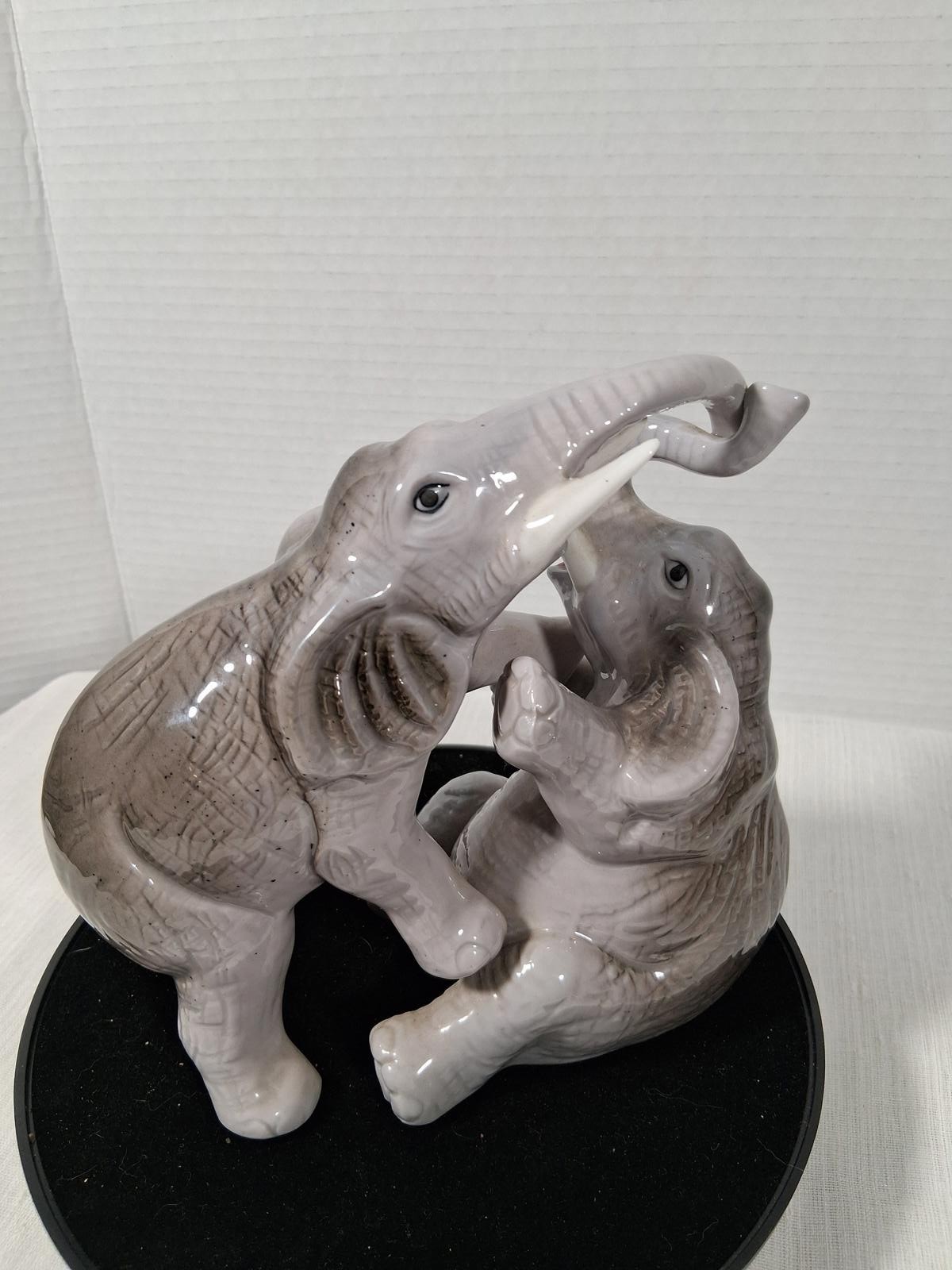Ceramic Porcelain Elephant Figurine – Playful Two-Elephant Sculpture