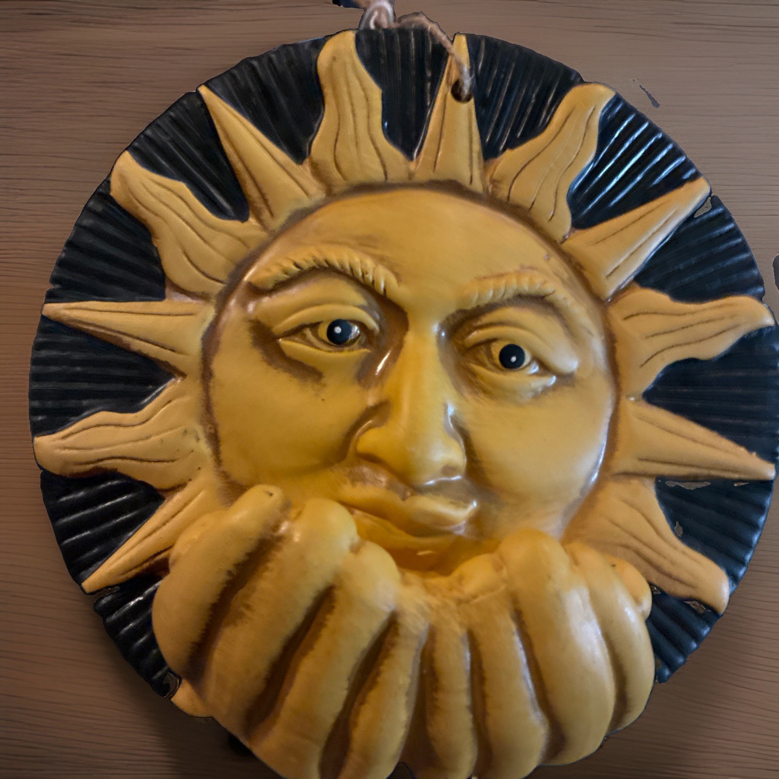 Ceramics. Wall decoration, sun with hands. 22 cm. England.