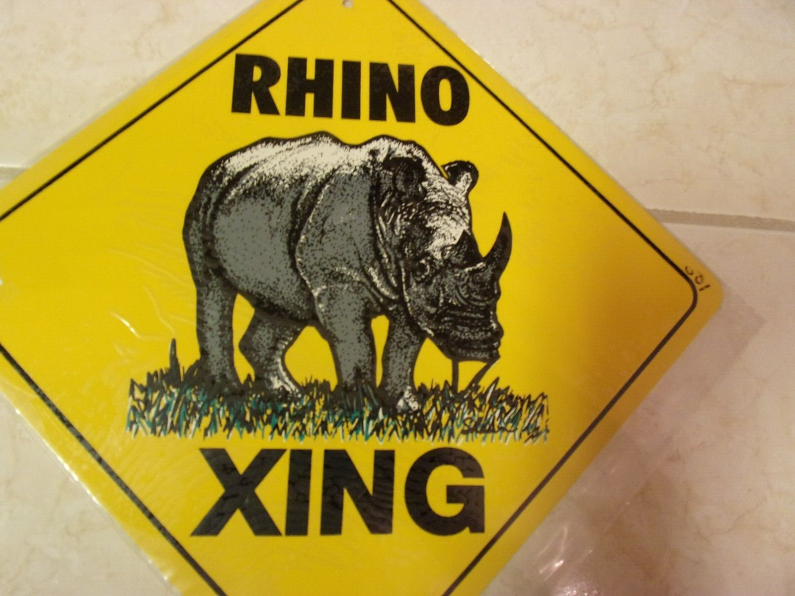 RHINO Aluminum Novelty Amber color Sign 17&Prime; X 17&Prime; DIAGONAL SIGN (CROSSING)