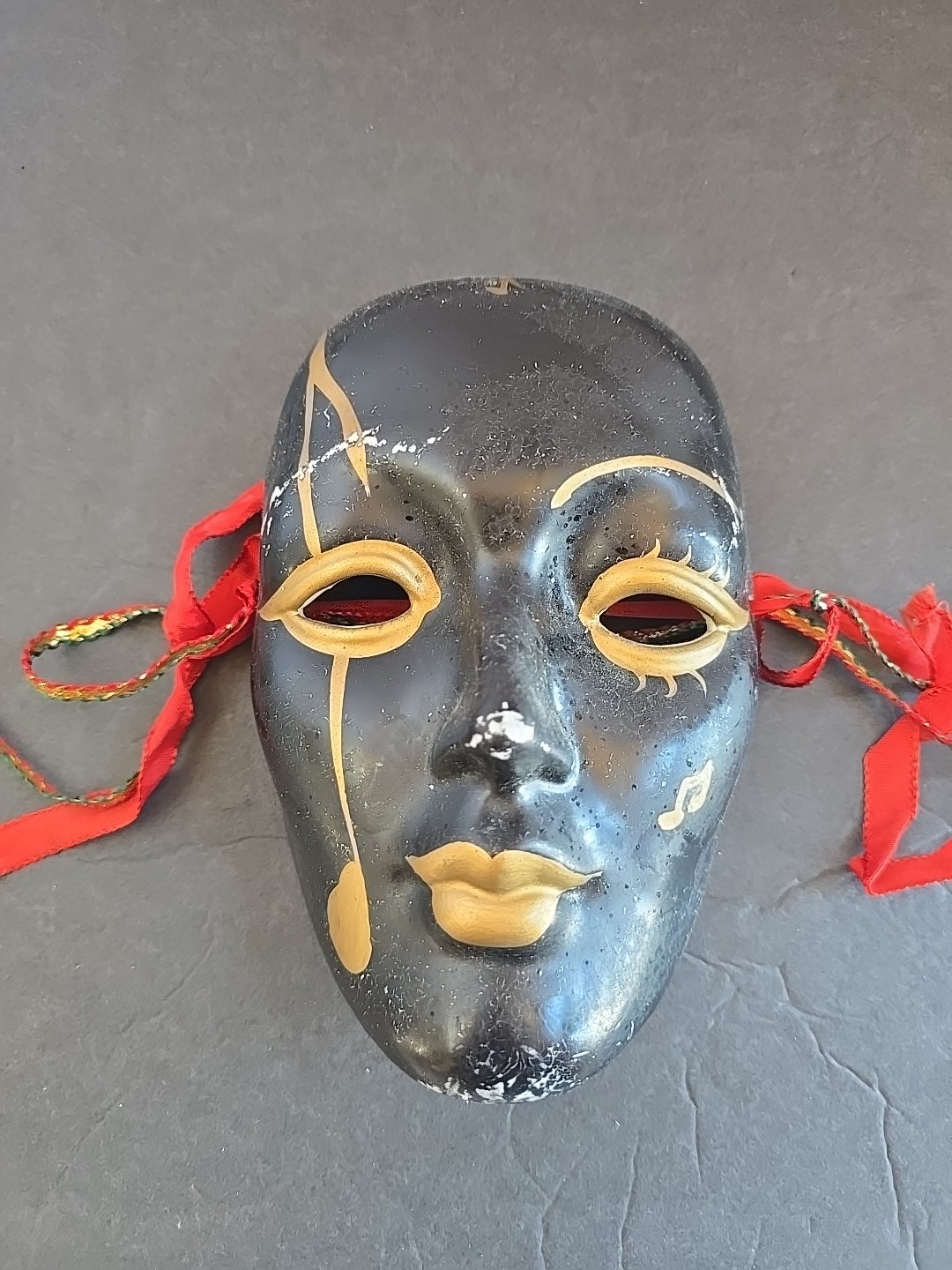 Black And Gold Painted Porcelain Mask.