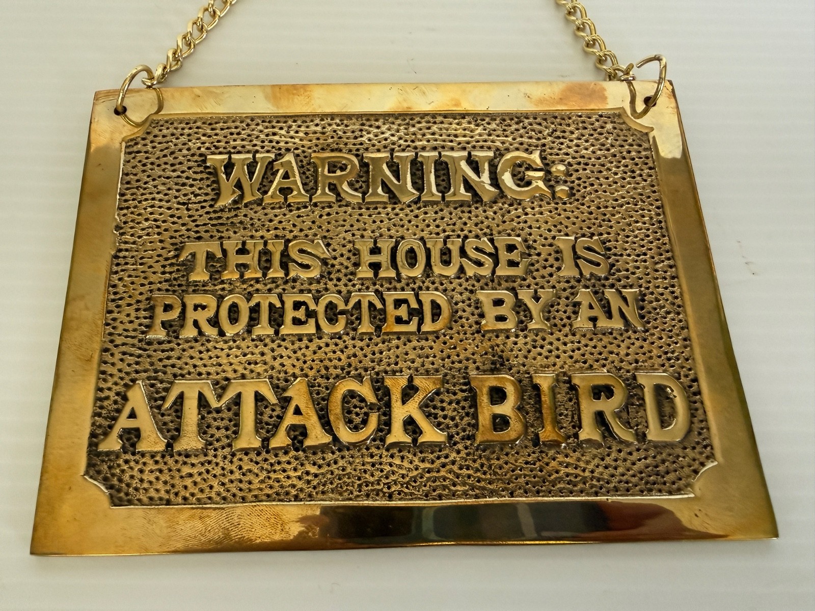 vintage solid brass wall plaque « Warning, this house protected by attack bird »