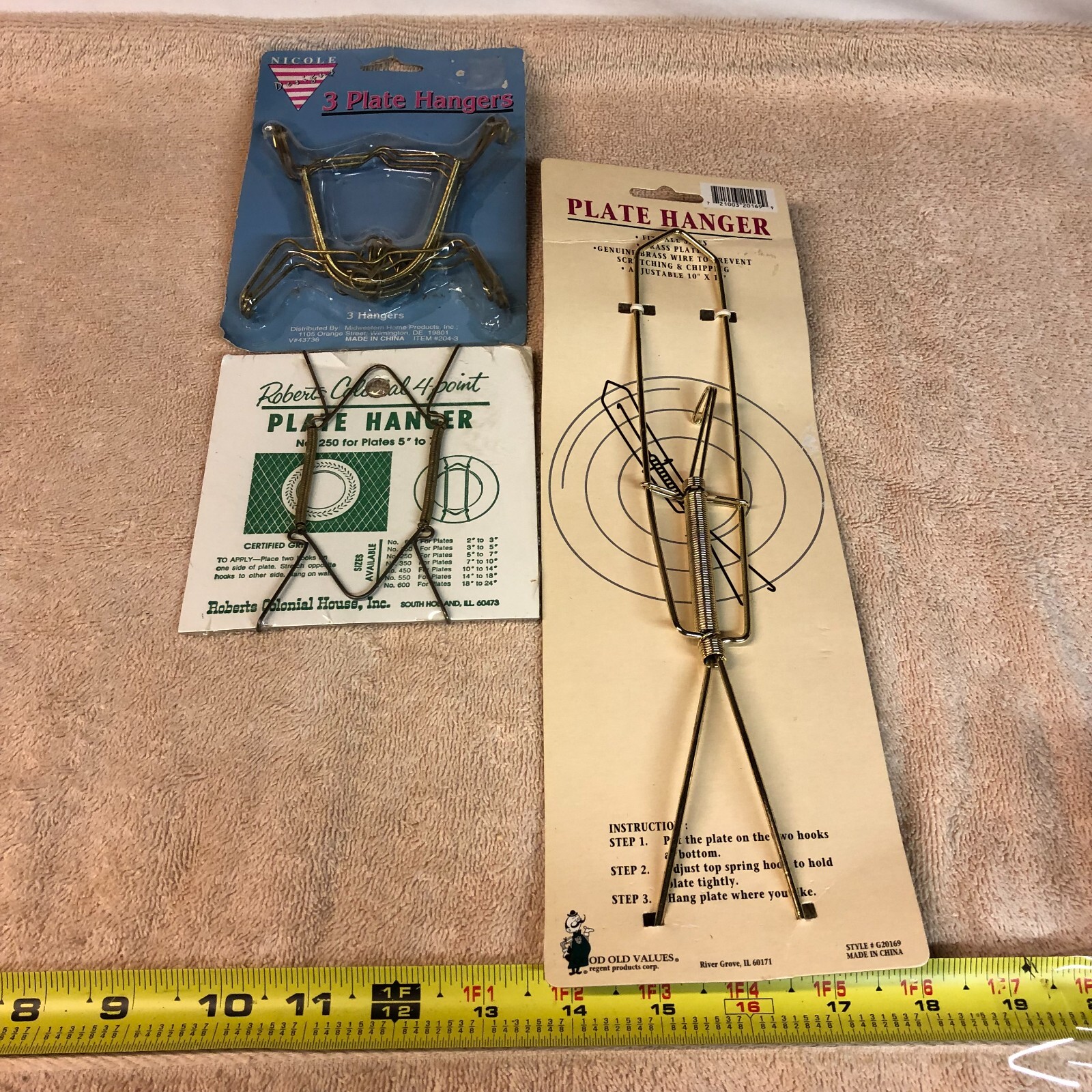 LOT OF 5 PLATE HANGERS