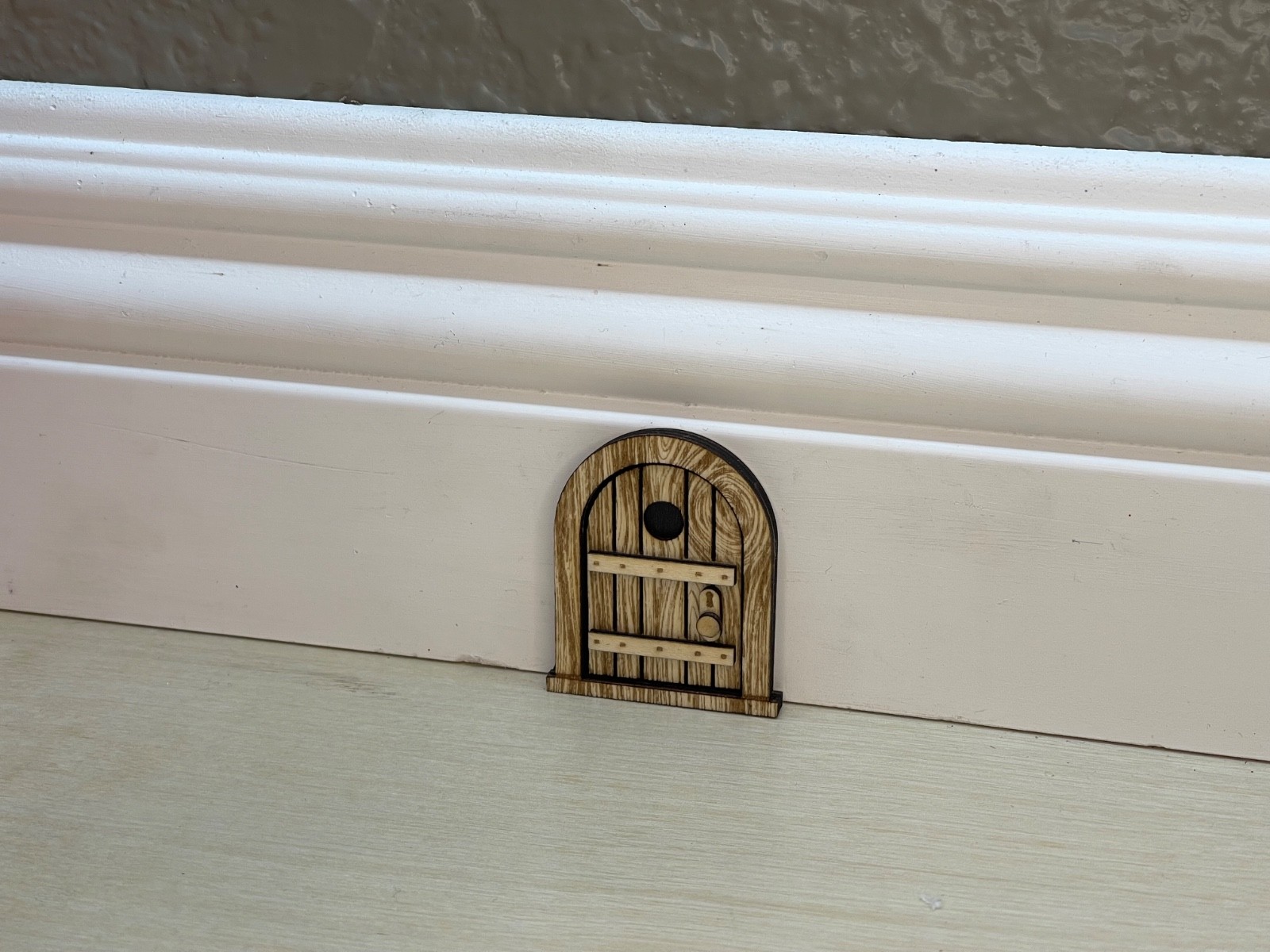 Handcrafted Mouse Door Baseboard decor 2 inch tall.