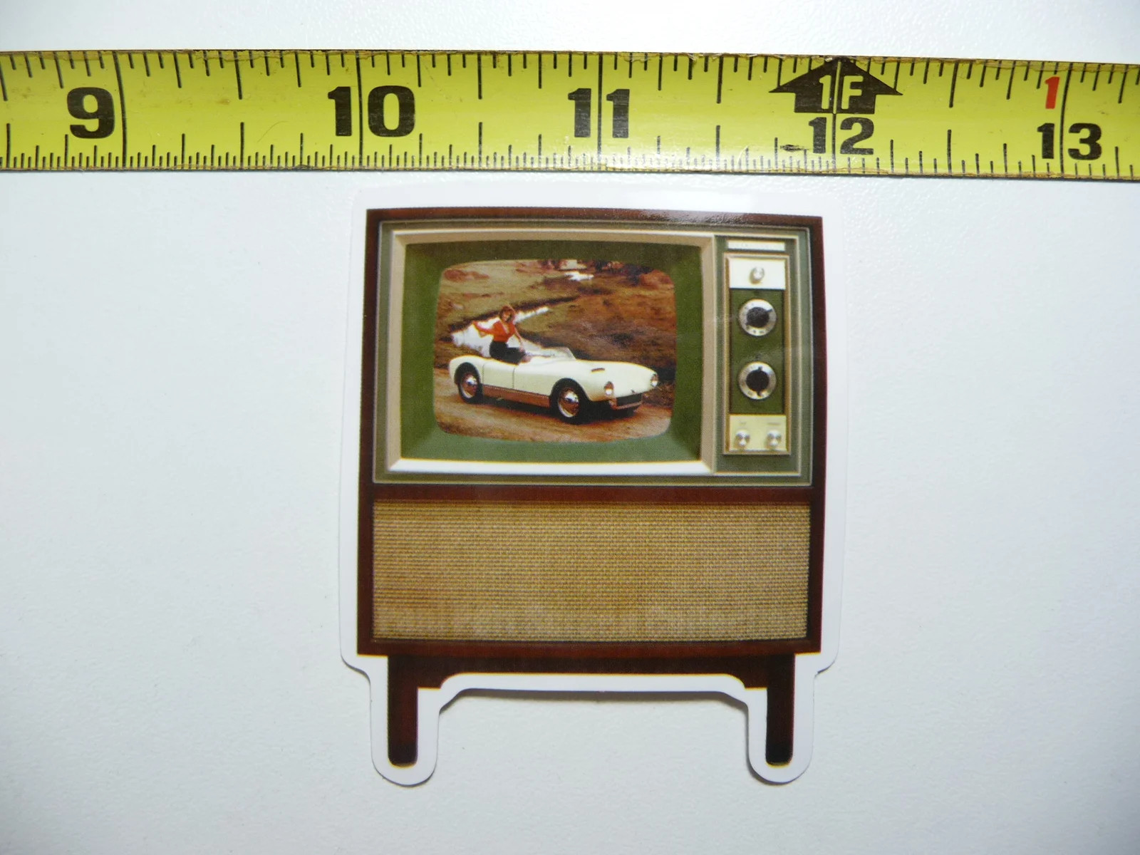RETRO WOMAN ON SPORTS CAR SMALL STICKER DECAL SCREEN IMAGE OLD TV FUNNY
