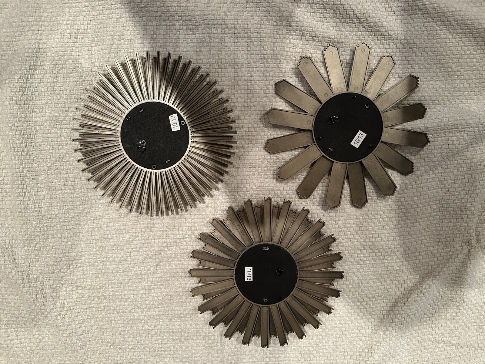 Three Piece Set Of Starburst Sun Bronze Plastic Mirrors